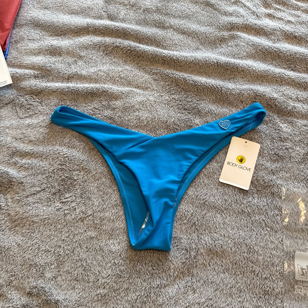 Body Glove Aqua Bikini bottom. Chic. Features a heart logo accent.